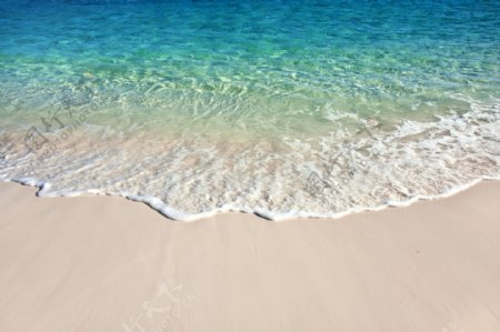 浪花沙滩背景图片
