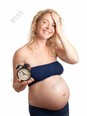 右手托闹钟的外国孕妇图片