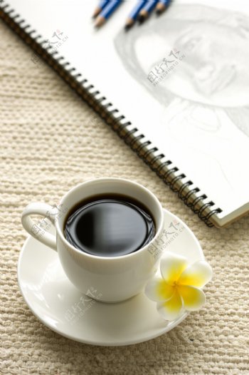 咖啡杯与记事本图片