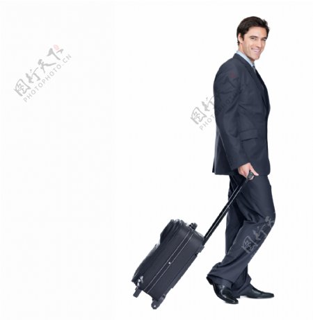 拖着行李箱的商务男性图片