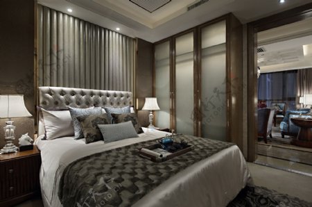 现代时尚卧室褐色背景墙室内装修效果图