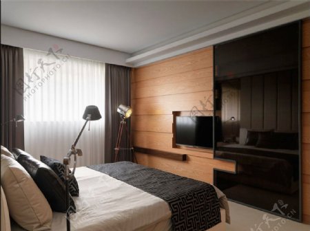 现代质感卧室浅橘色背景墙室内装修效果图